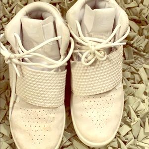 Little boys adidas sneakers.